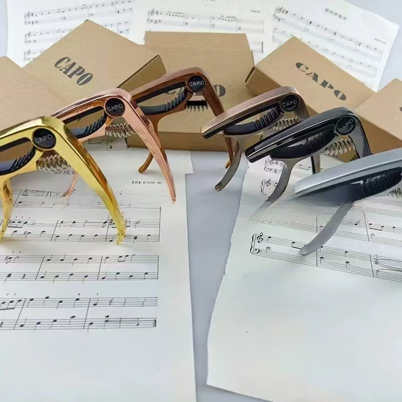 Musical Instrument Guitar Capo - Musical Instrument Ending In A ulasan dan harga